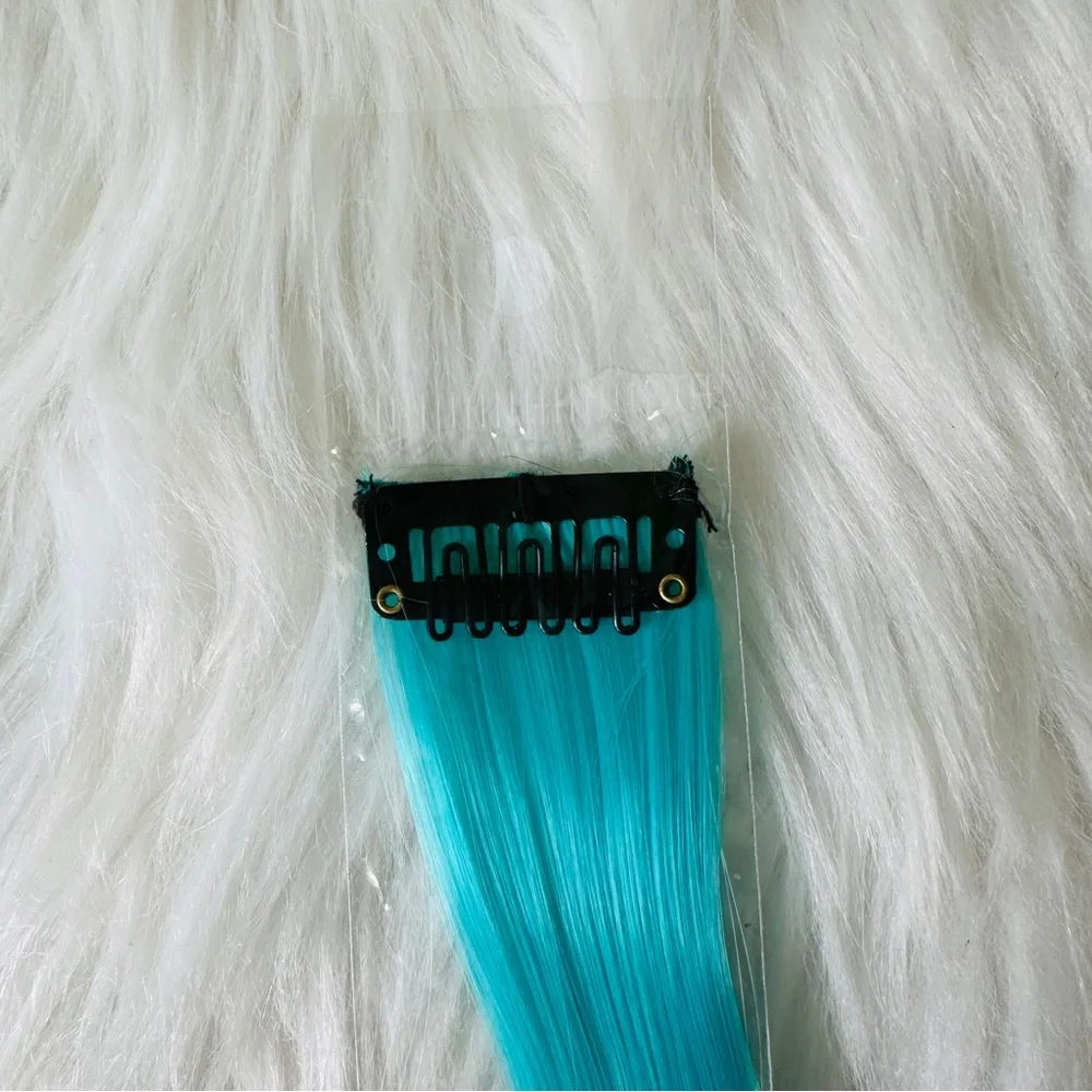 5x$25 Brand New Mermaid Clip On 20” Hair Extensions. Super fun.